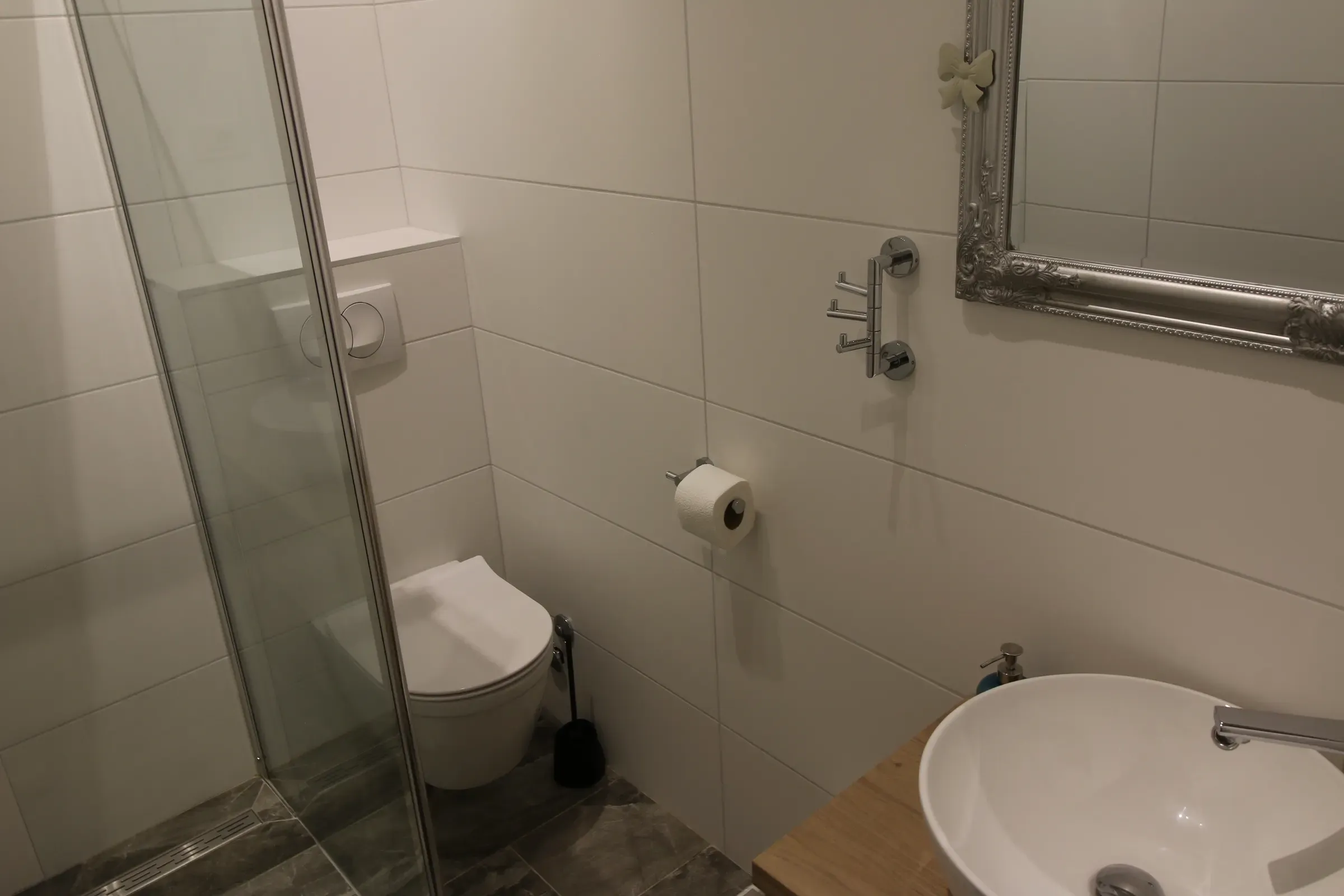 Modern bathroom with a walk-in glass shower