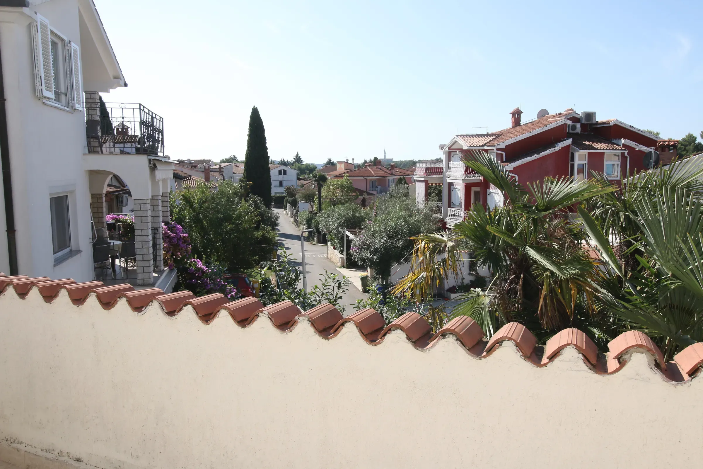 View over the tiled rooftops of the surrounding Rovinj neighbourhood
